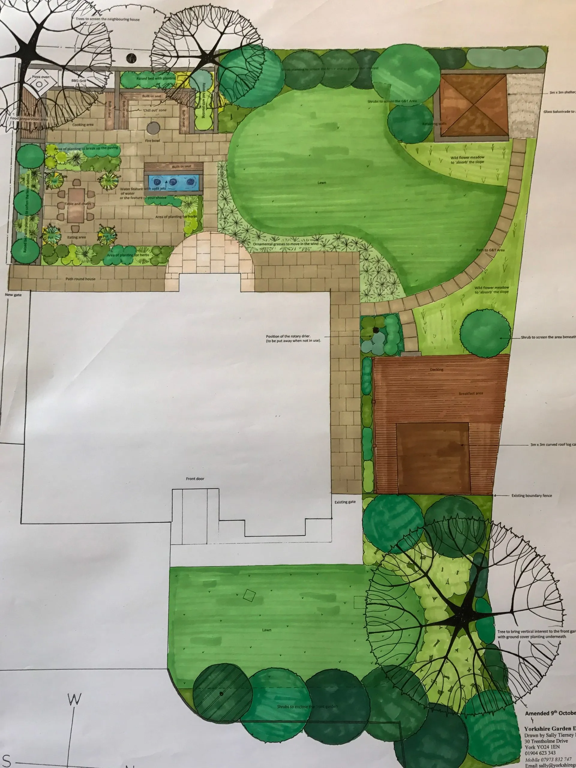 A Yorkshire cottage garden with deep herbaceous borders in summer