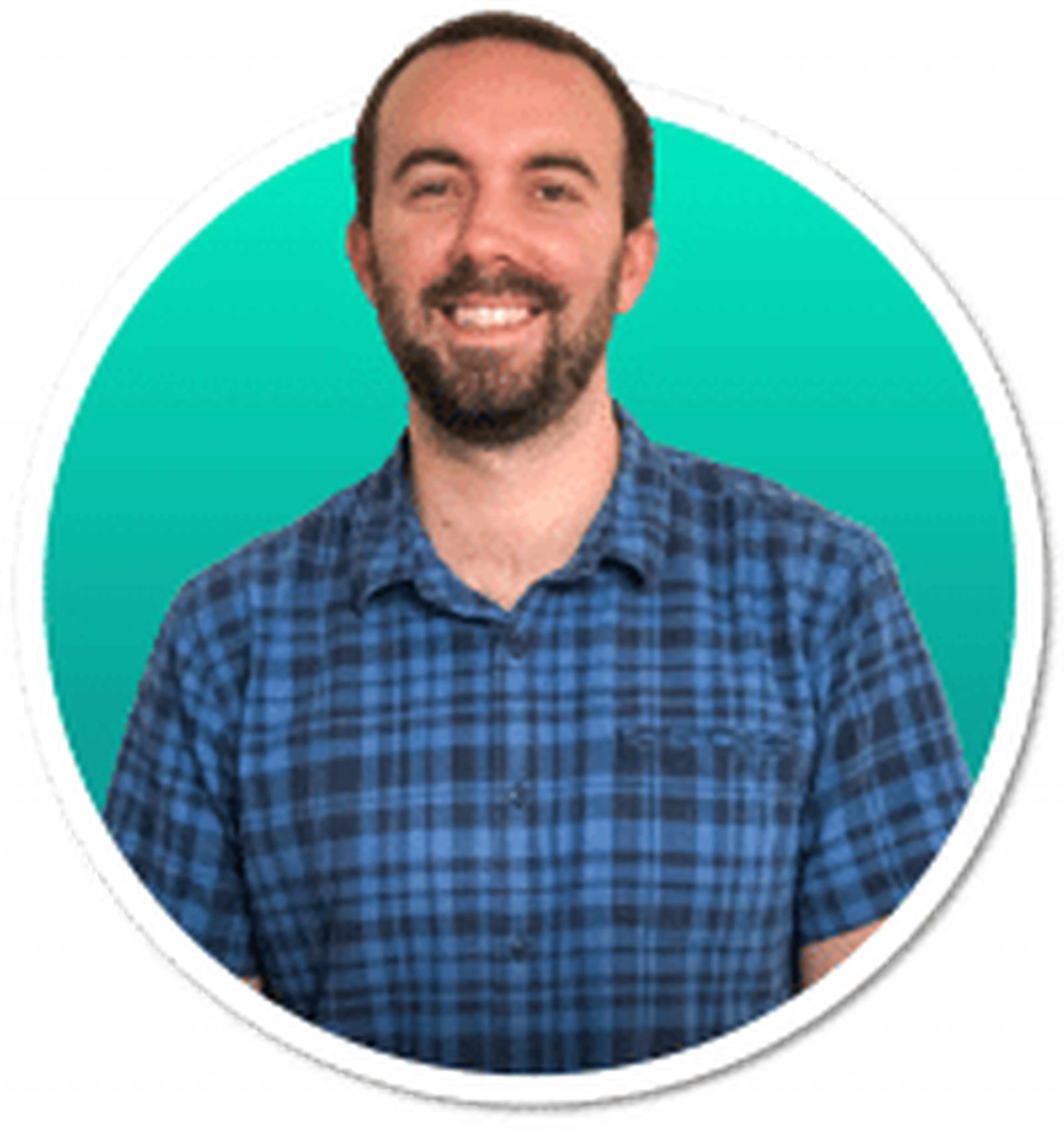 Phil Heusser, co-founder of Motifmotion, smiling in a blue plaid shirt