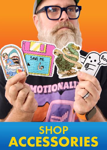 Bearded man in glasses holding up a handful of colorful graphic stickers