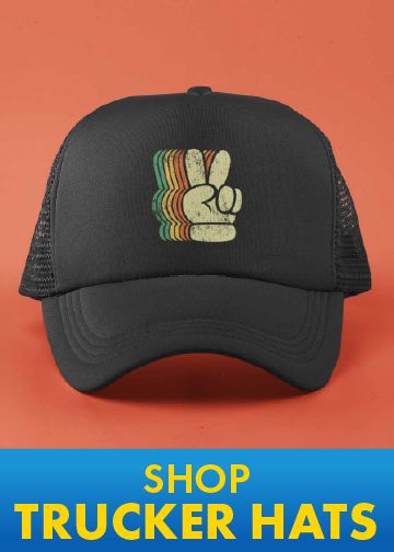 Black trucker hat with a retro peace sign hand graphic on an orange background