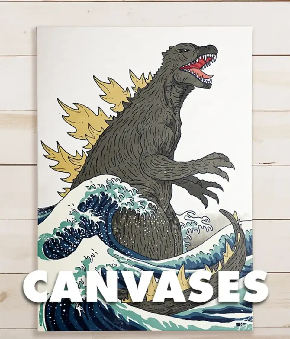 Hokusai-style Godzilla wave canvas leaning against wall next to small plant, labelled 'Canvases'.