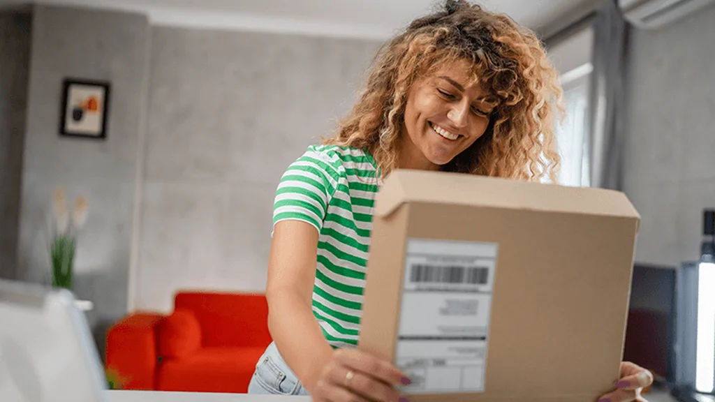 Lady opening up Prop 65 box