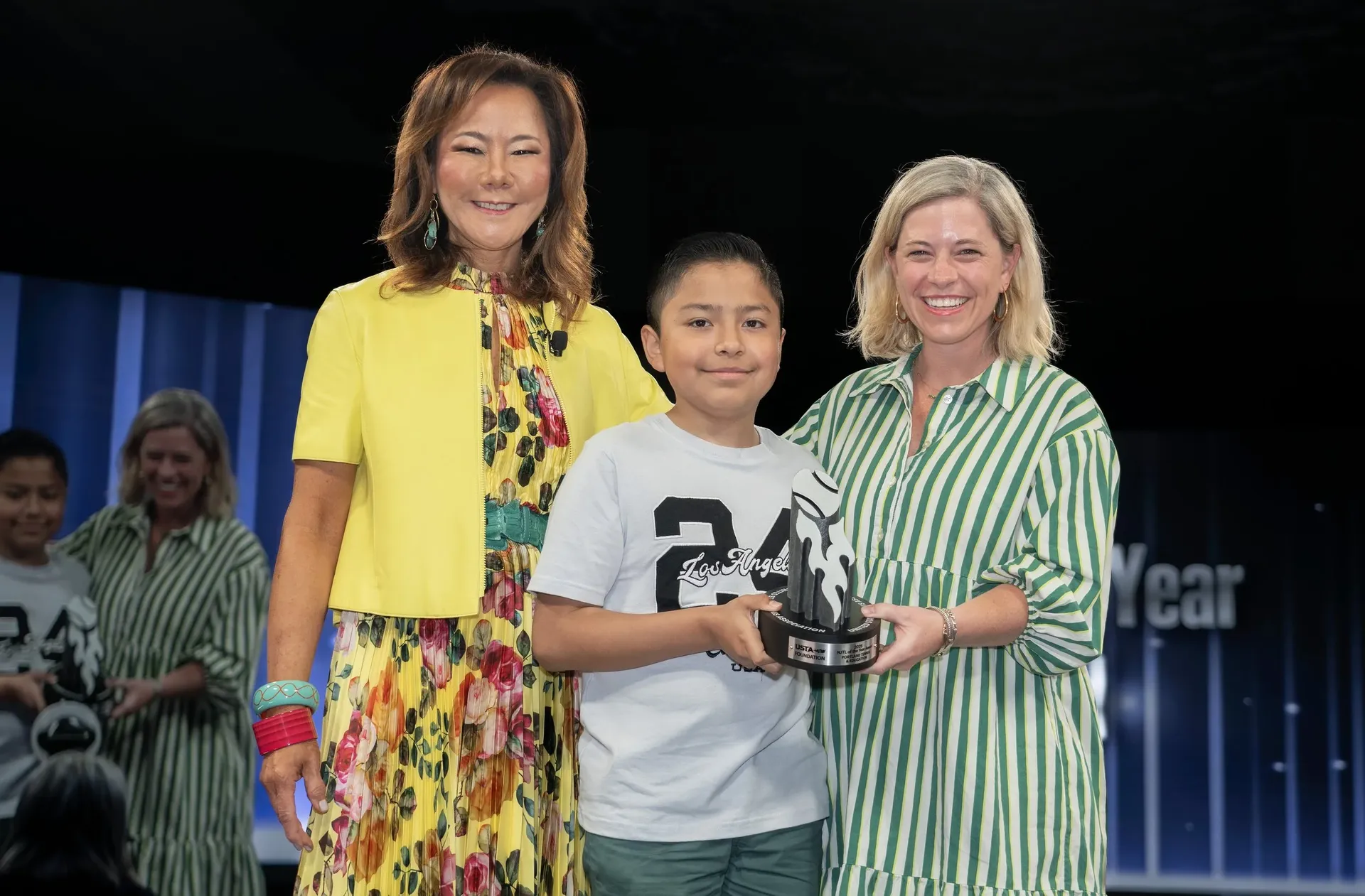 Kathleen Wuu, President of the USTA Foundation with NJTL of the Year Award: Portland Tennis & Education, Campbell Glenn Garonzic and Jazel Diaz de Jesus Martinez