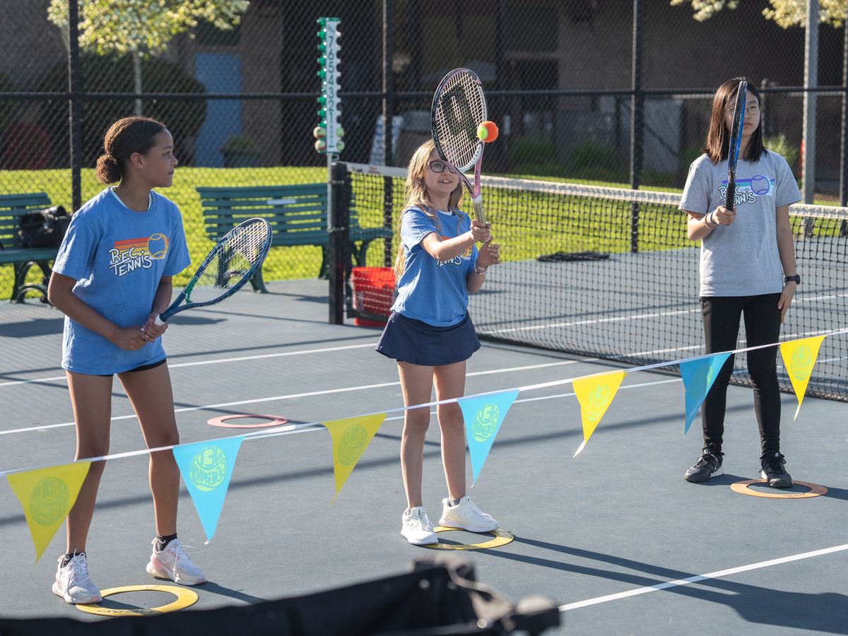 girls playing tennis