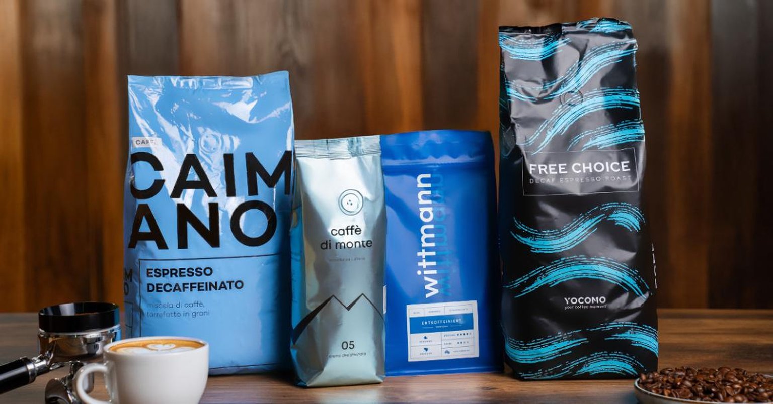 Decaffeinated coffee beans and freshly brewed decaf coffee.