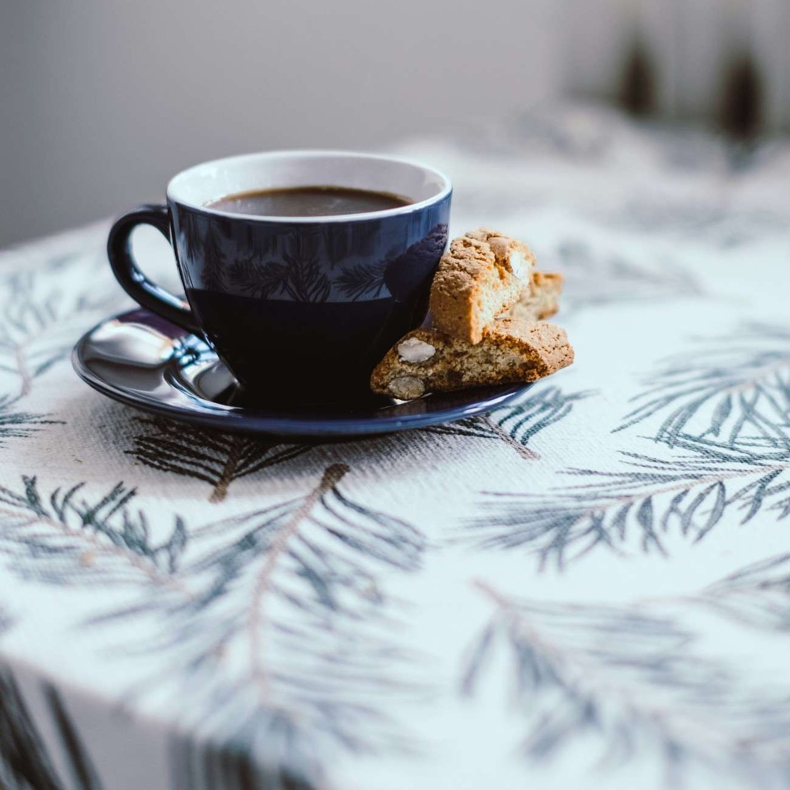 coffee and biscuit on a table