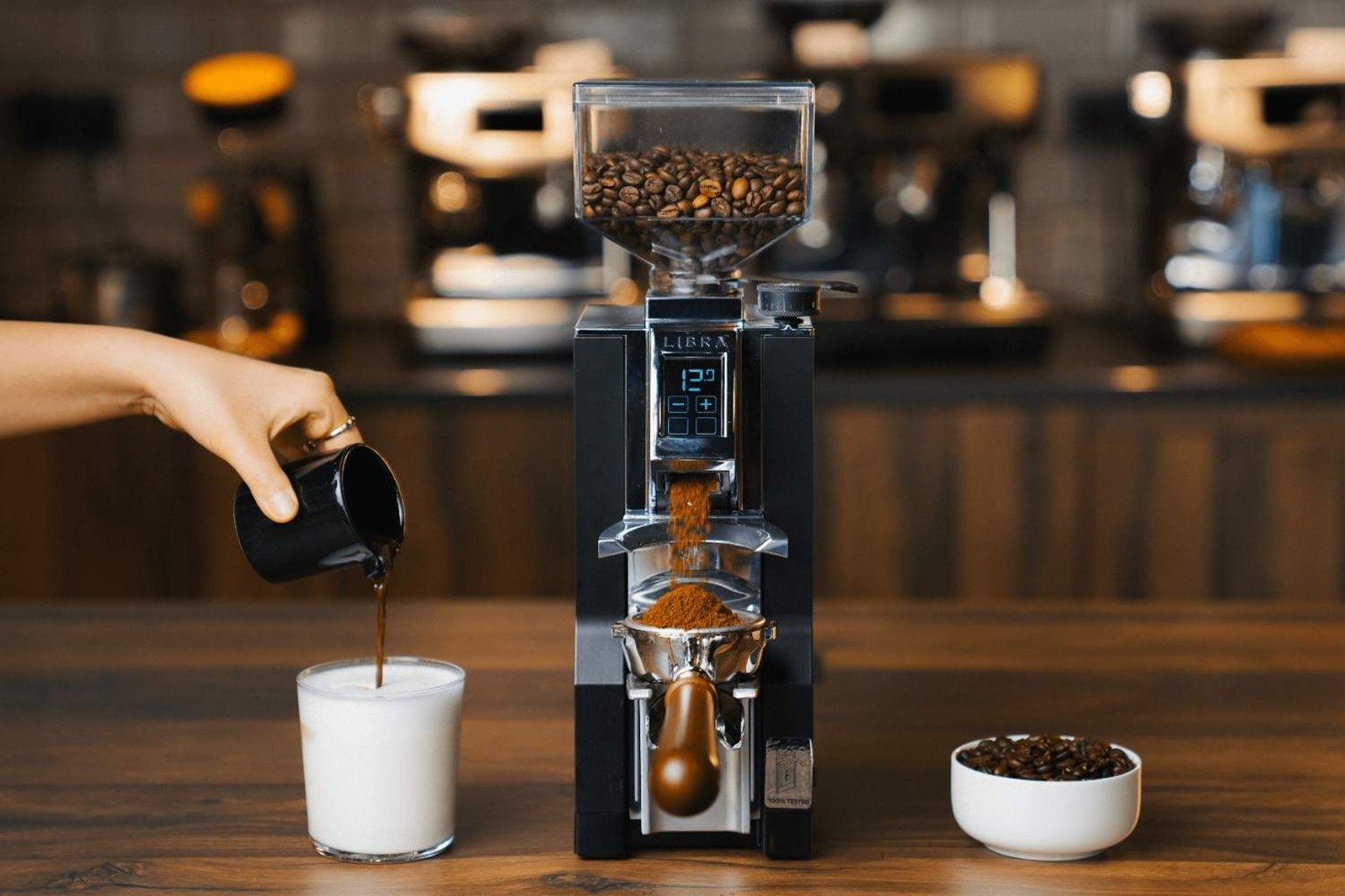 Electric coffee grinder on a countertop.