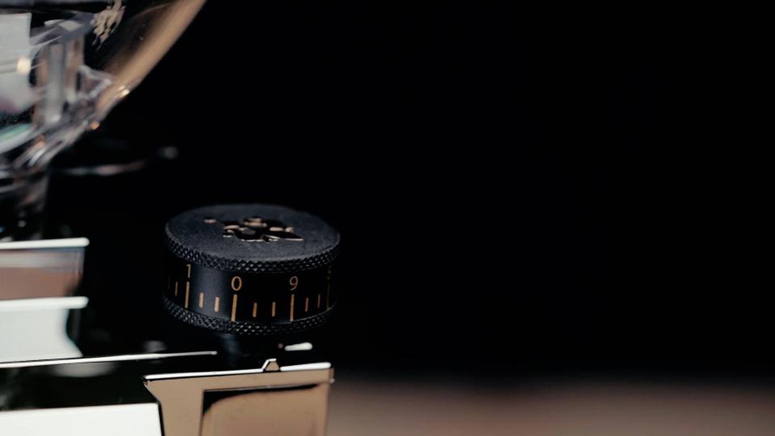 Electric coffee grinder on a countertop.