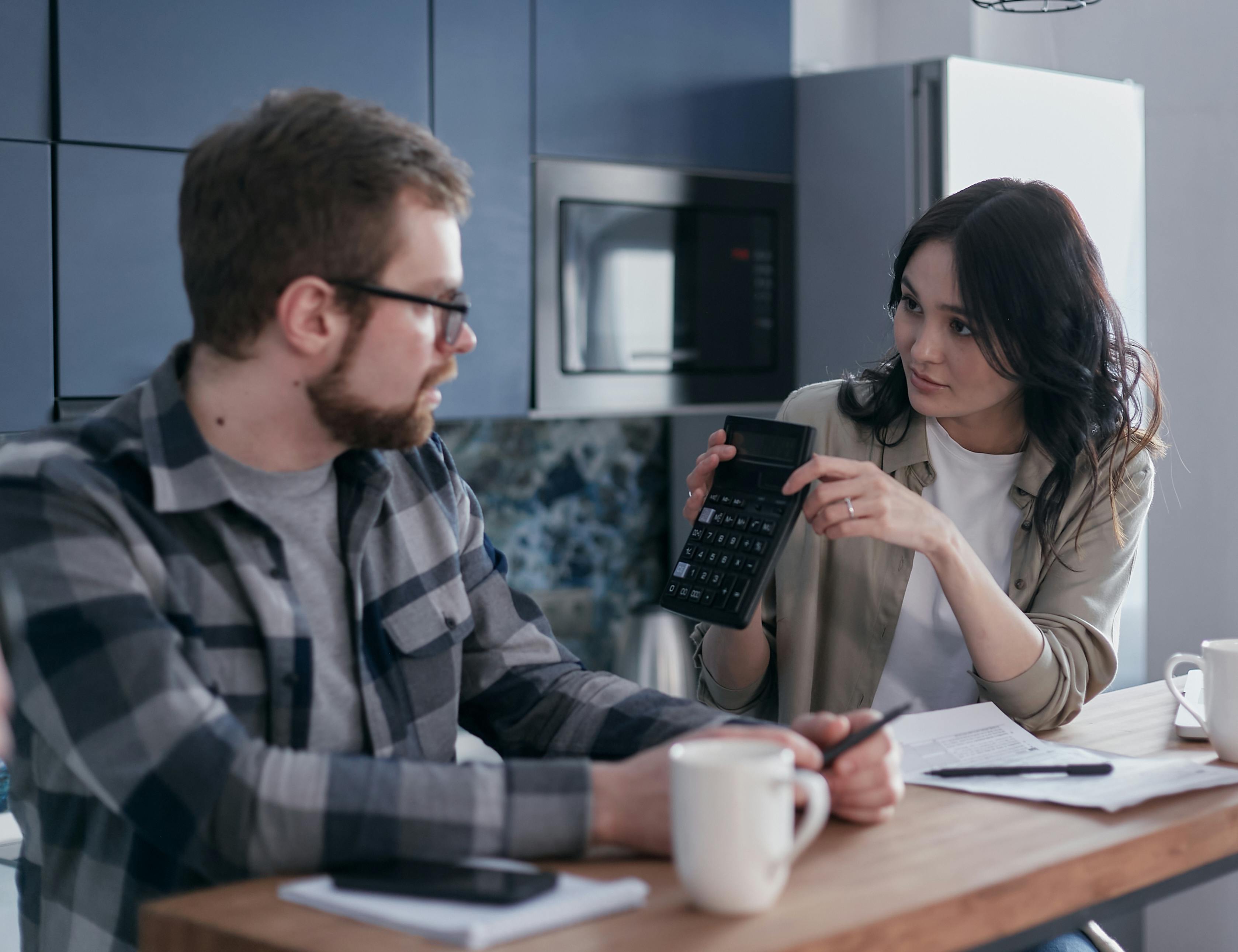HVAC contractor presenting a detailed service estimate to a homeowner at their property
