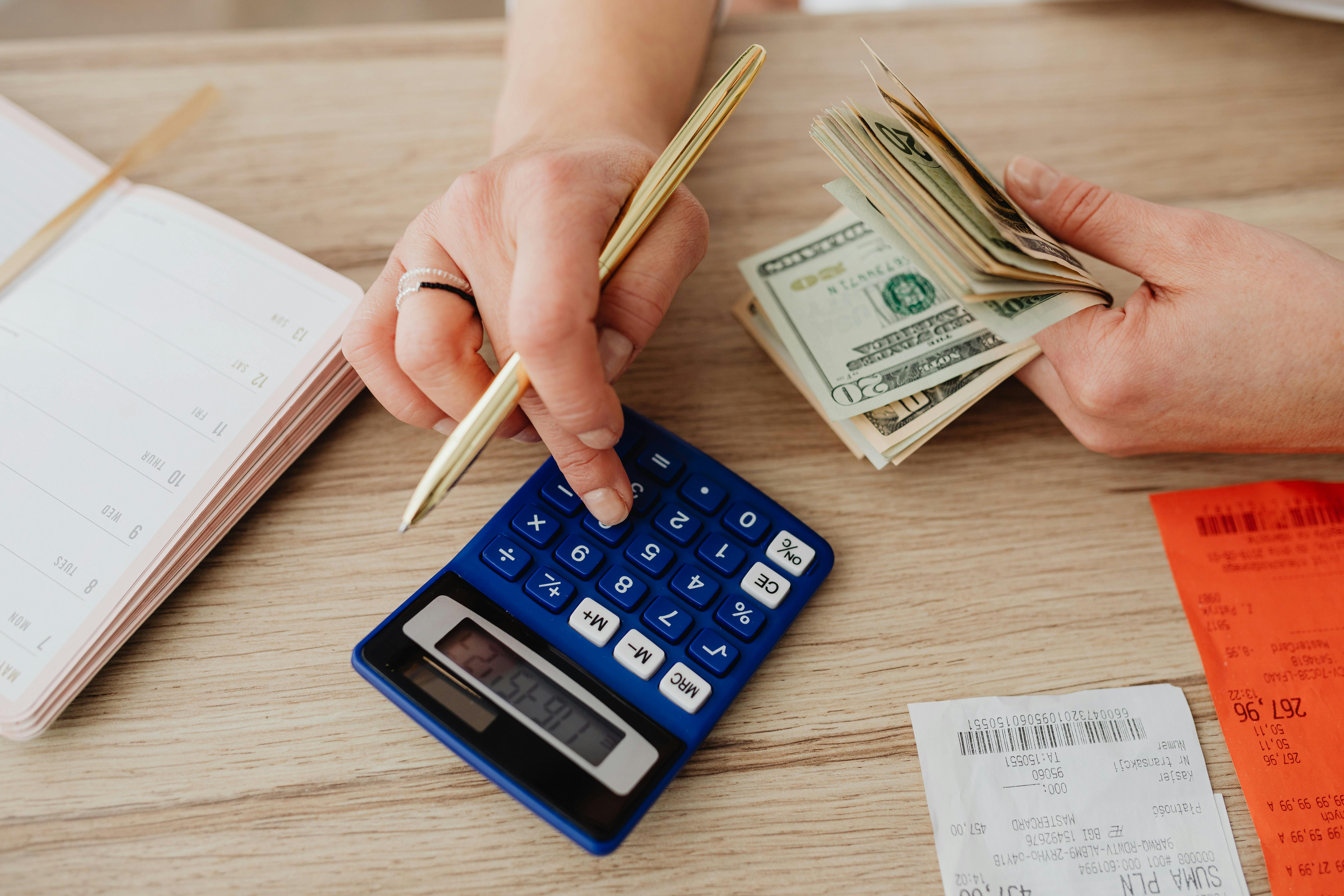 HVAC business owner reviewing expense reports, labor costs, fuel expenses, inventory spending, and profitability dashboards to identify financial leaks and improve business performance.
