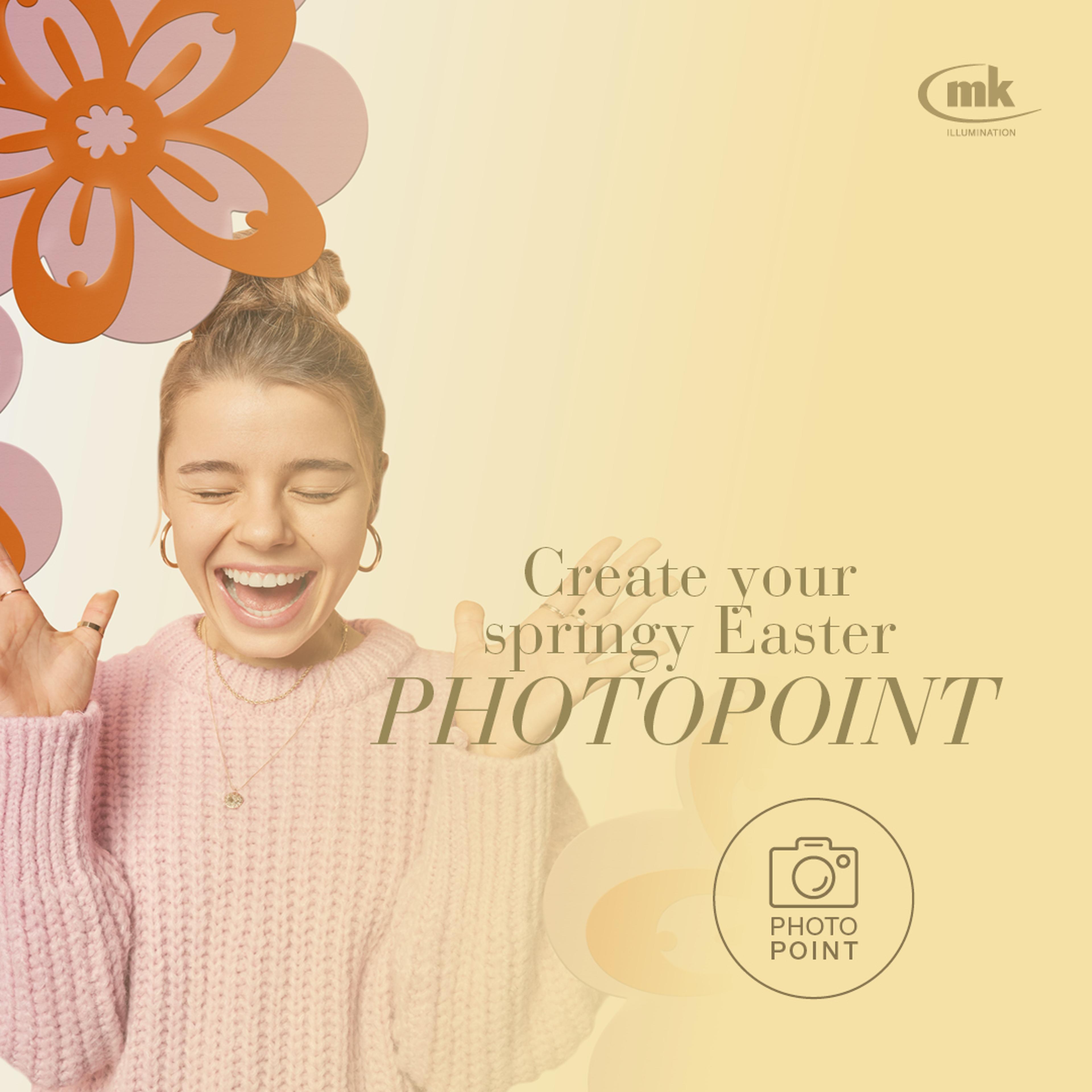 Junge Frau im rosa Pullover lächelt vor blumigem Hintergrund, Text: "Create your springy Easter PHOTOPOINT", Logo von MK Illumination.