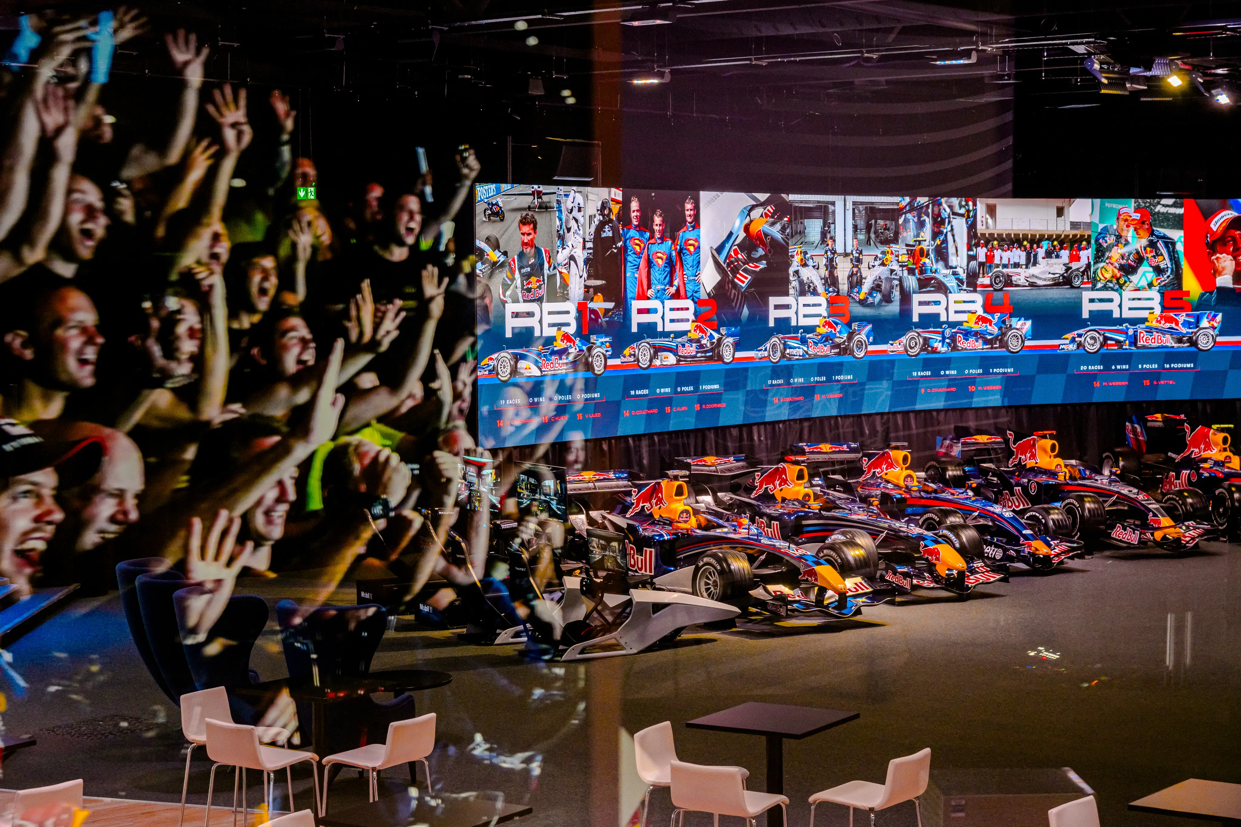 The Oracle Red Bull Racing MK7 event space. A collection of F1 cars over the yers and a in the reflection, a celebration of Sebastian Vettel winning his 4th world championship.