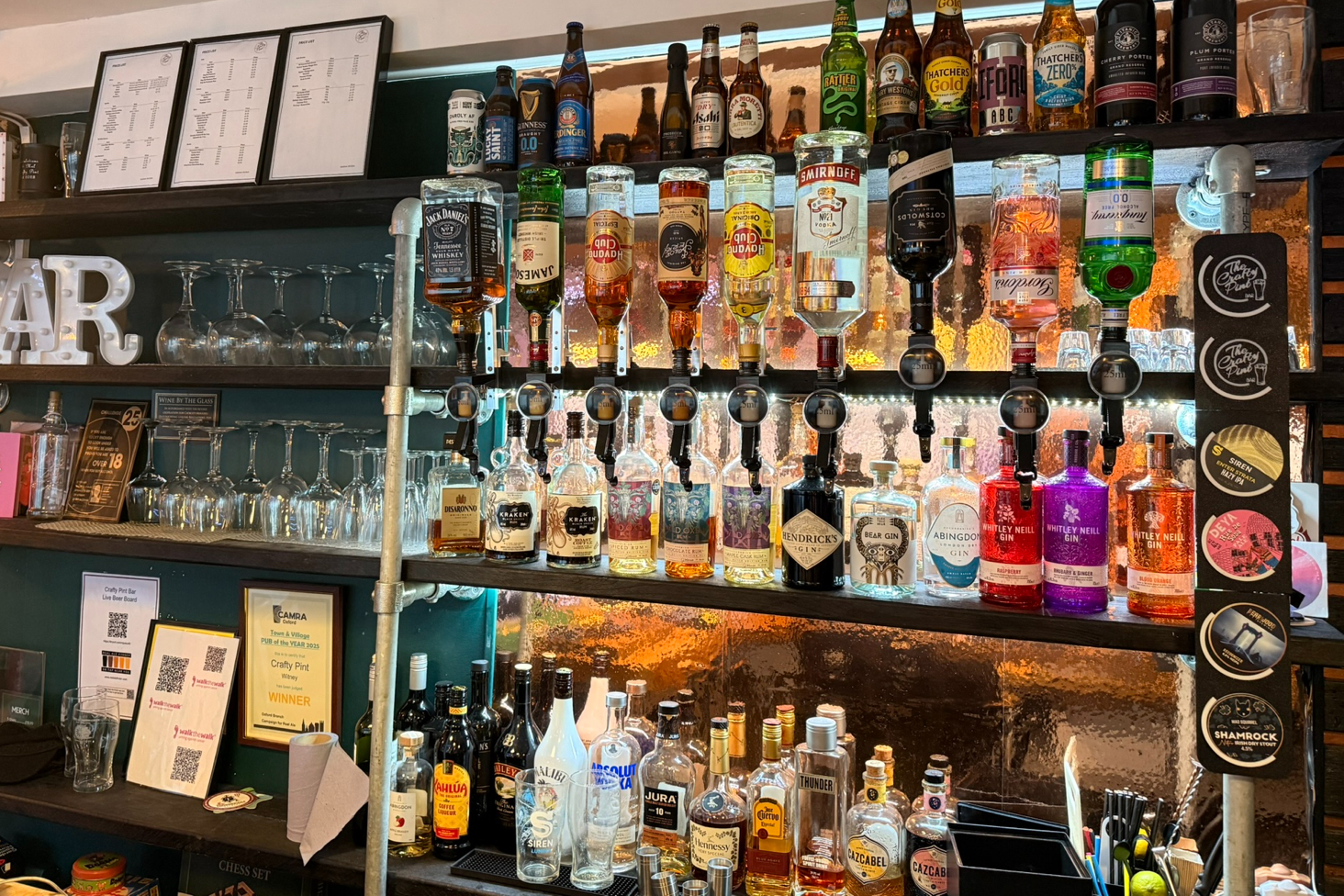 A selection of spirits sat behind The Crafty Pint bar