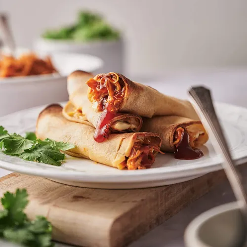 Crispy honey BBQ chicken taquitos