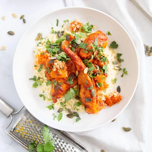 Harissa kip met pompoen en couscous