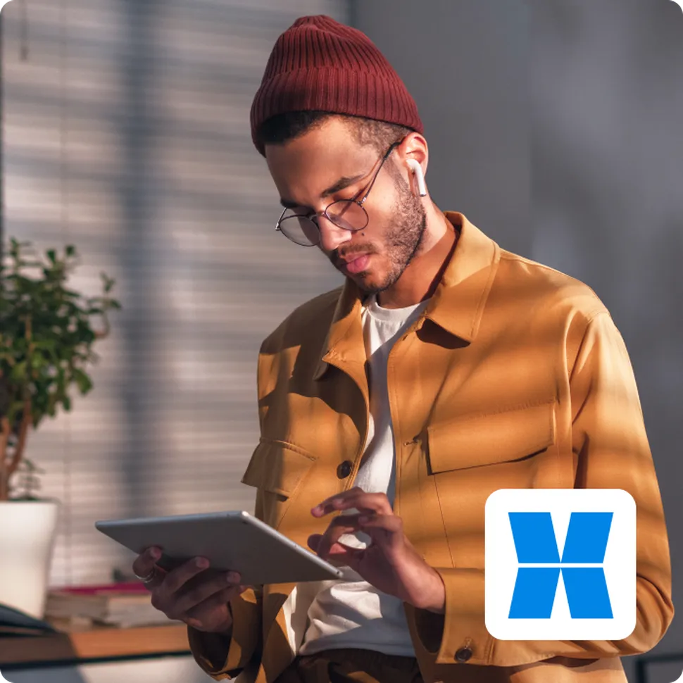A businessman working on a tablet