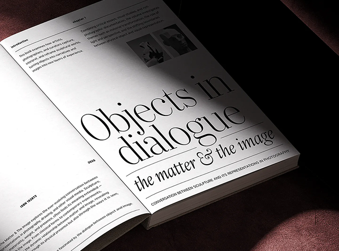A rendering of a book open to a spread that reads “Objects in dialogue: the matter & the image”