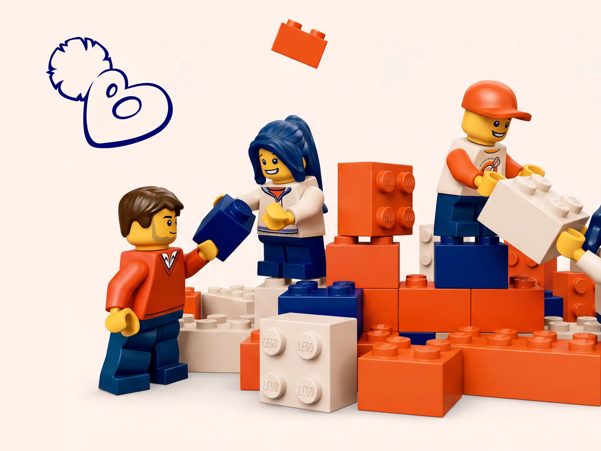 LEGO figurines constructing a colorful block wall. A blue graffiti-like heart with a face is drawn on the left.