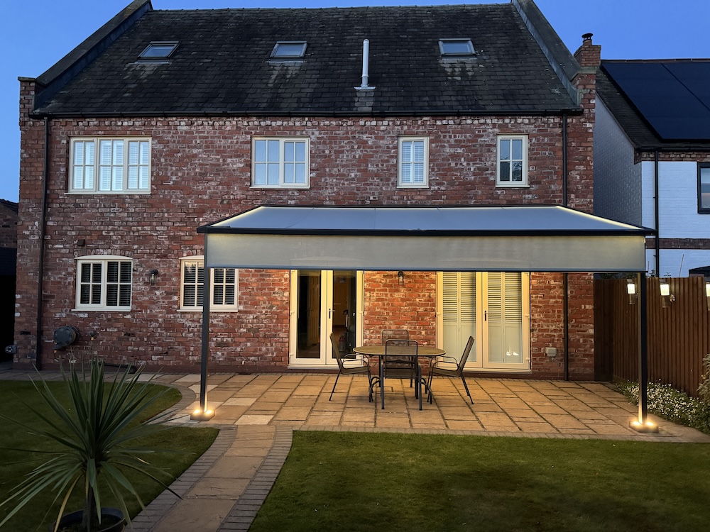 Pergola awning with integrated shade for evening entertaining