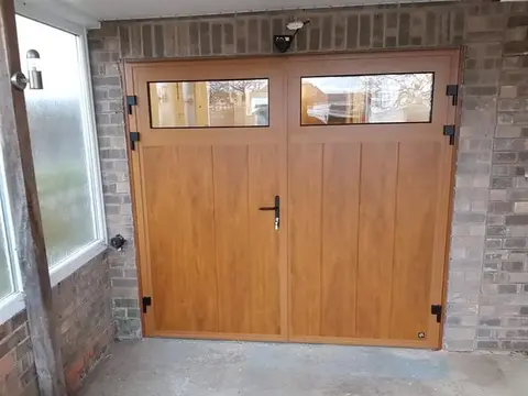 Insulated side-hinged garage door installed in Grantham