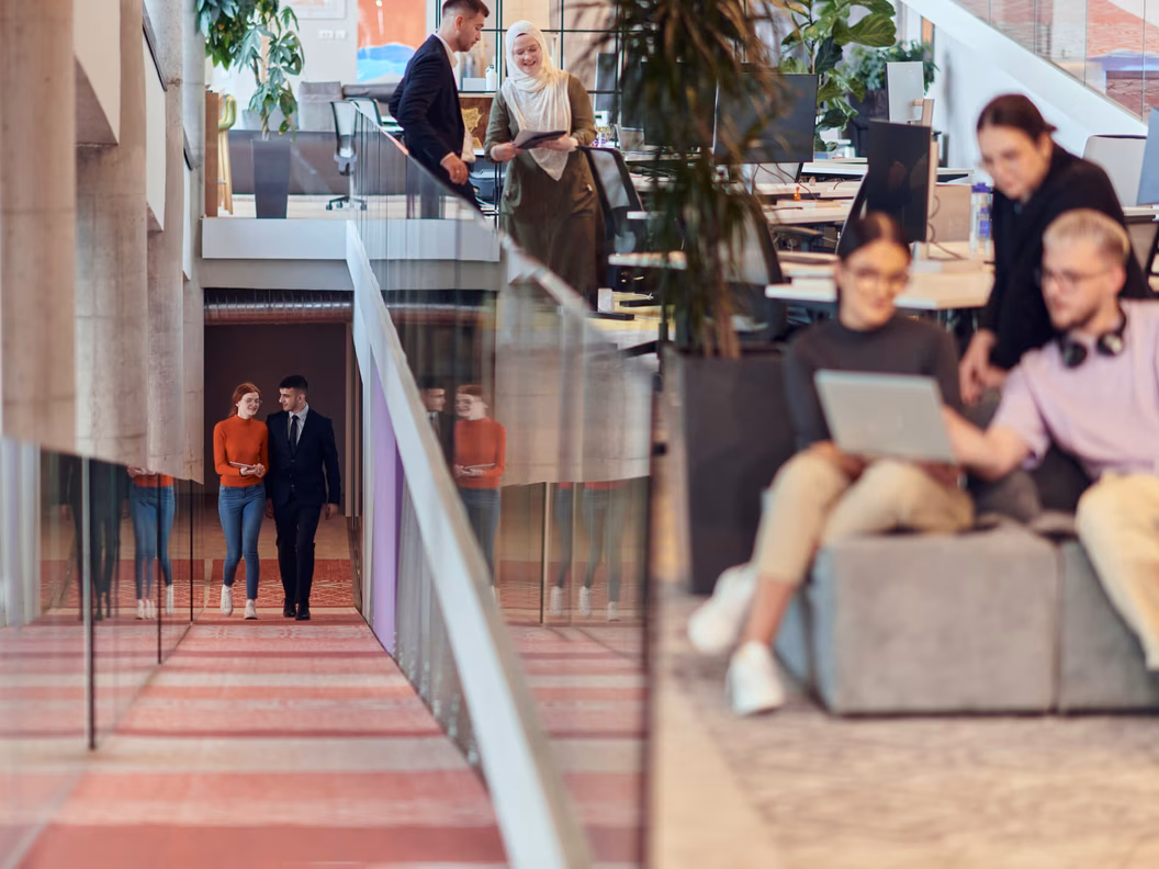 Diverse group of young professionals jointly tackling various business problems and challenges
