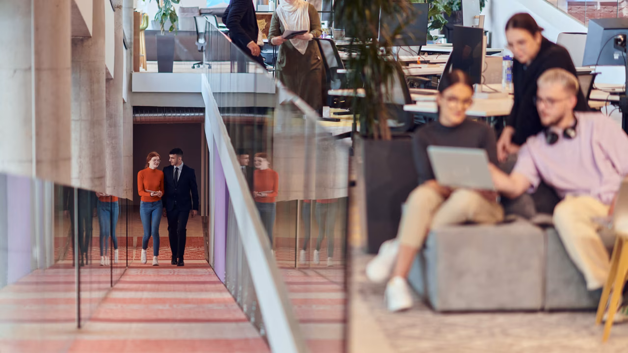 Diverse group of young professionals jointly tackling various business problems and challenges