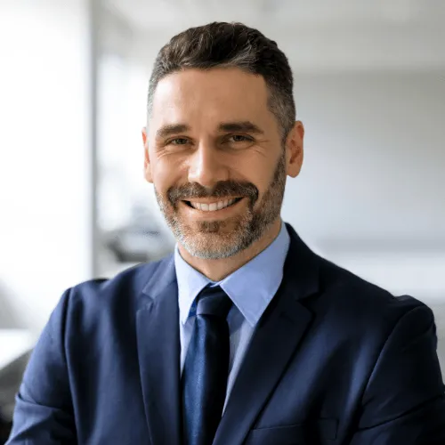 dave harvey smiling inside an office