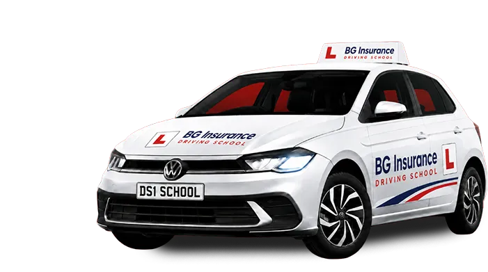 White Volkswagen driving school car with BG Insurance branding and L-plates on roof sign and doors.
