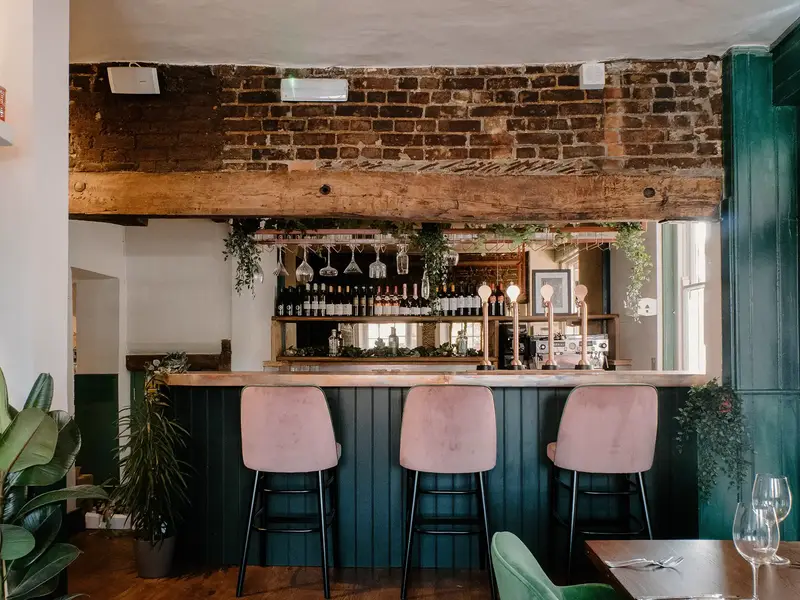 Amor Barstool installed in a hospitality interior