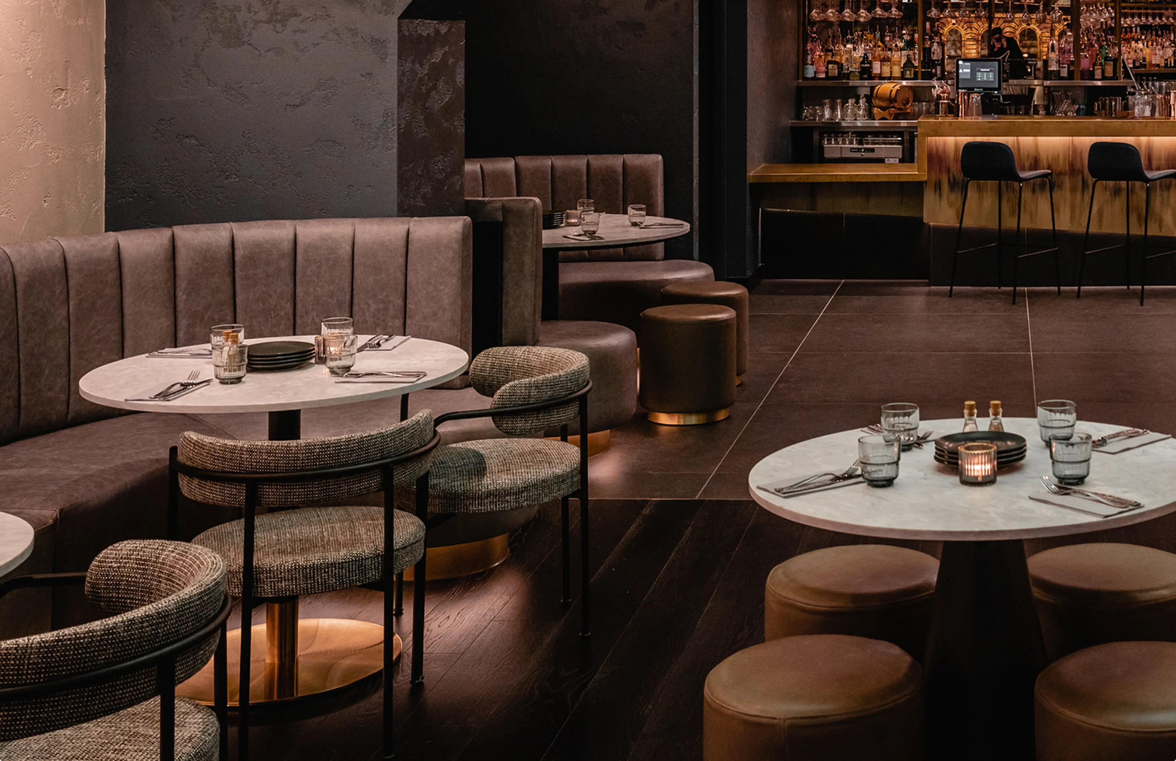 Dining tables and upholstered seating at The Alchemist Glasgow