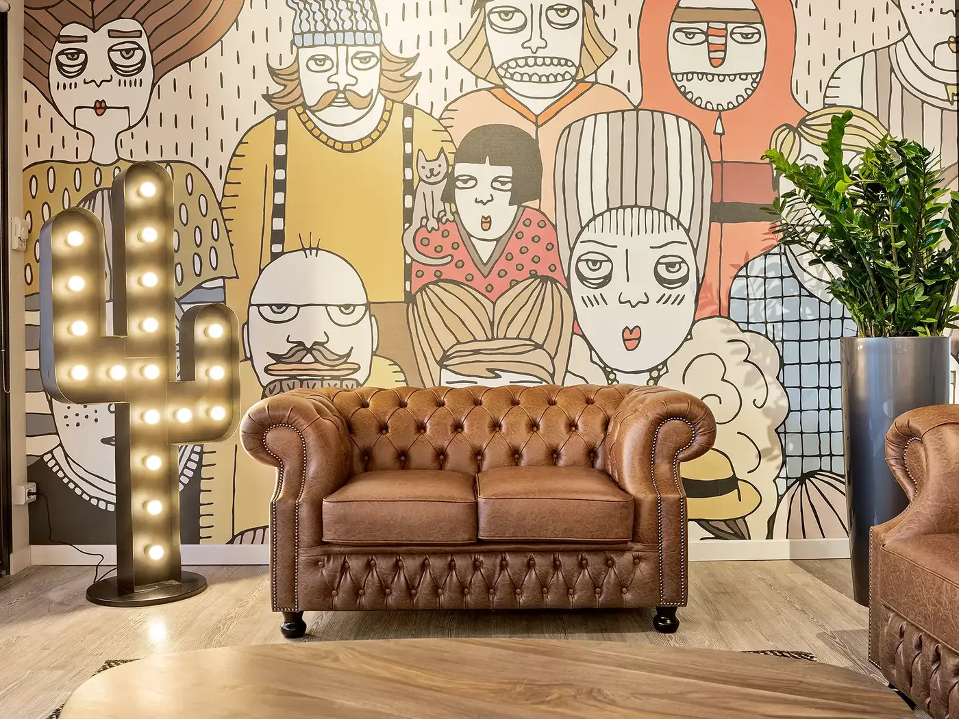 Battersea Two Seater Sofa installed in a hospitality interior