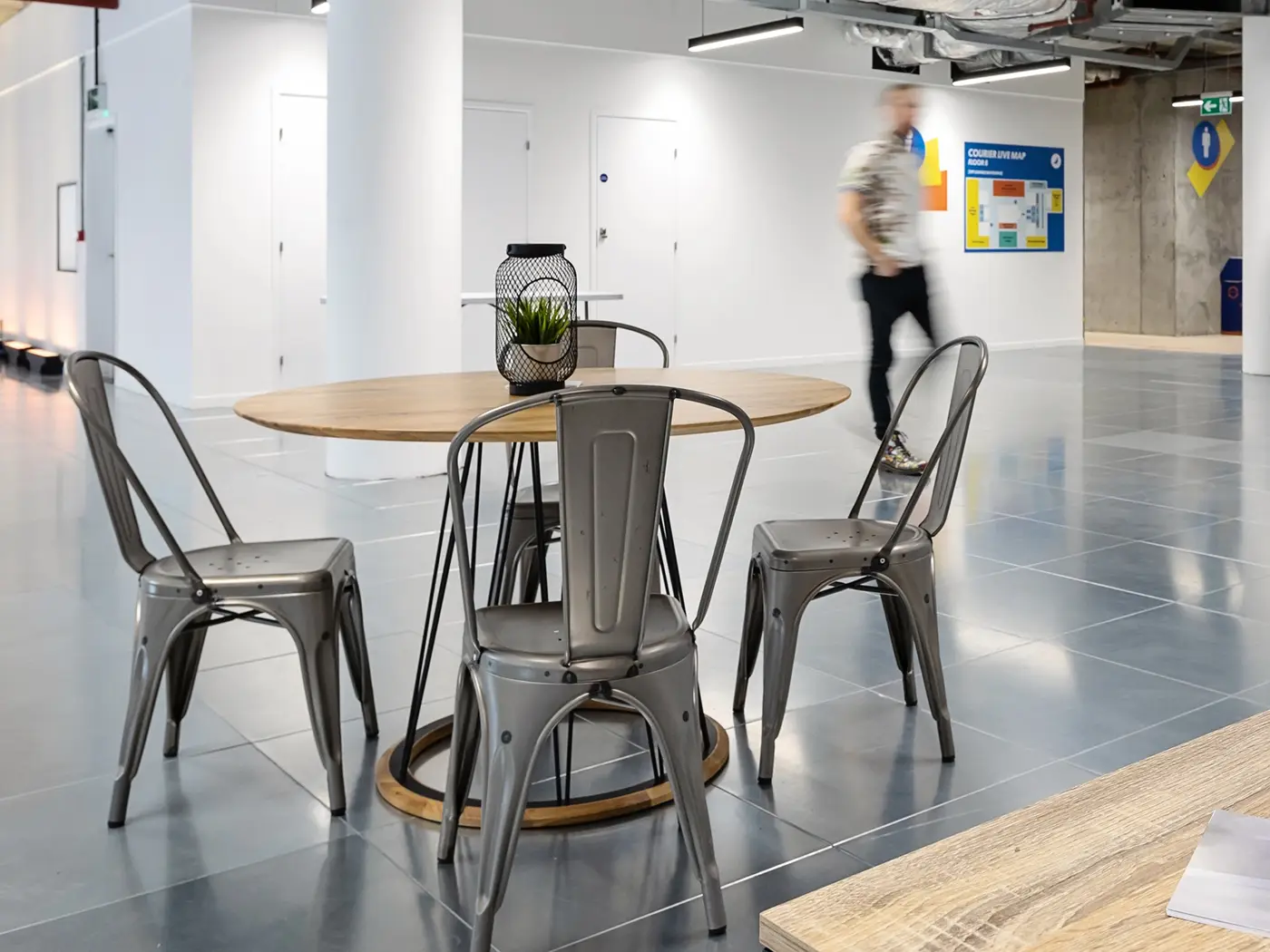 Compass Table installed in a hospitality interior