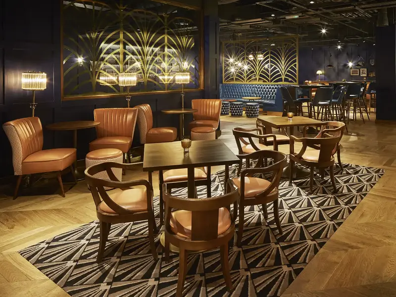 Denman Lounge Chair installed in a hospitality interior