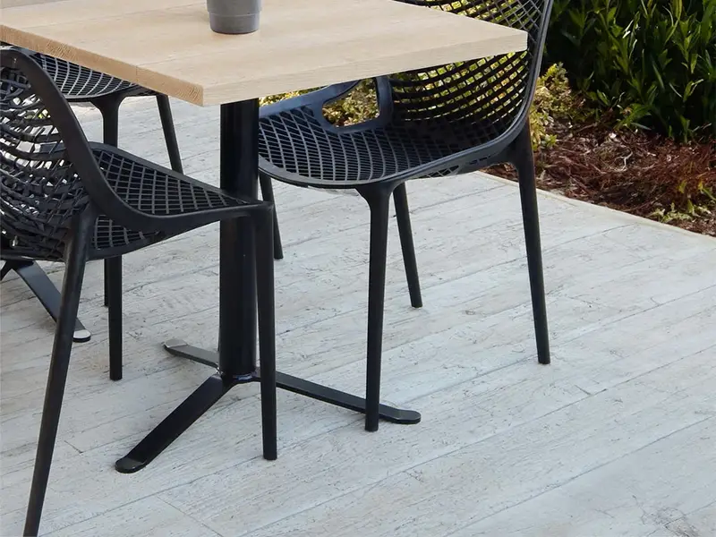 Adaptable Table Base installed in a hospitality interior