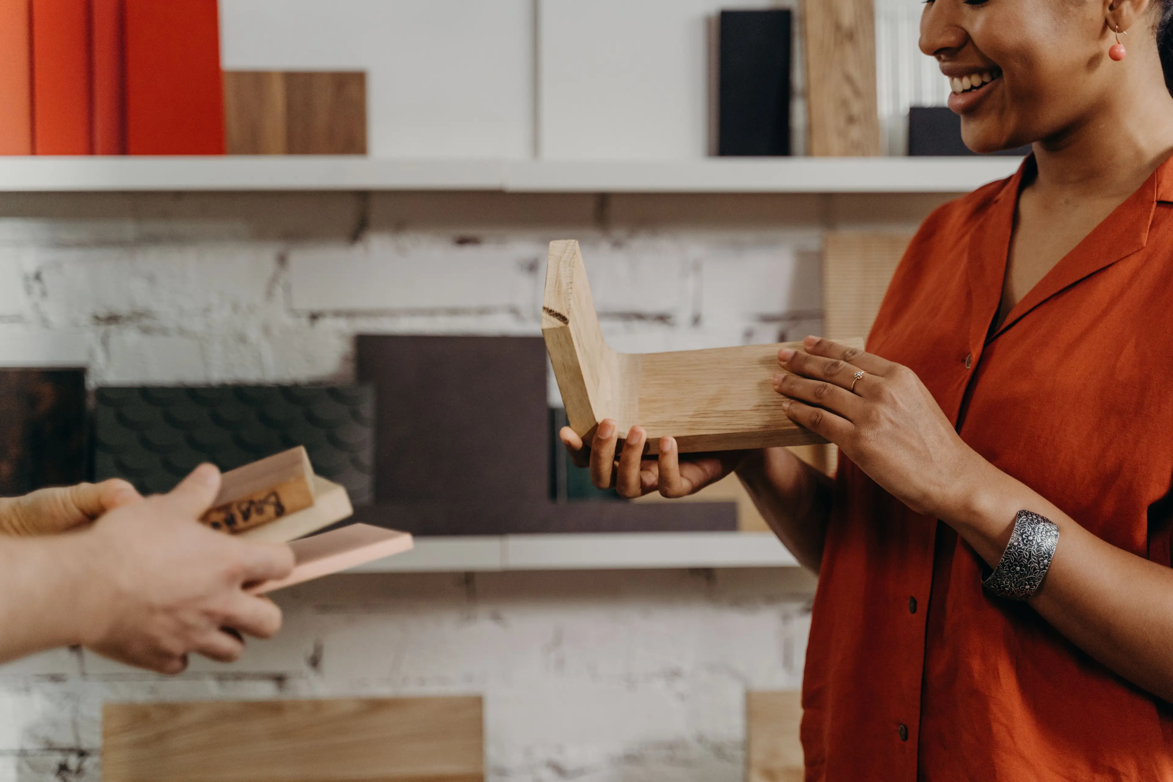 Furniture samples being discussed at a worktable