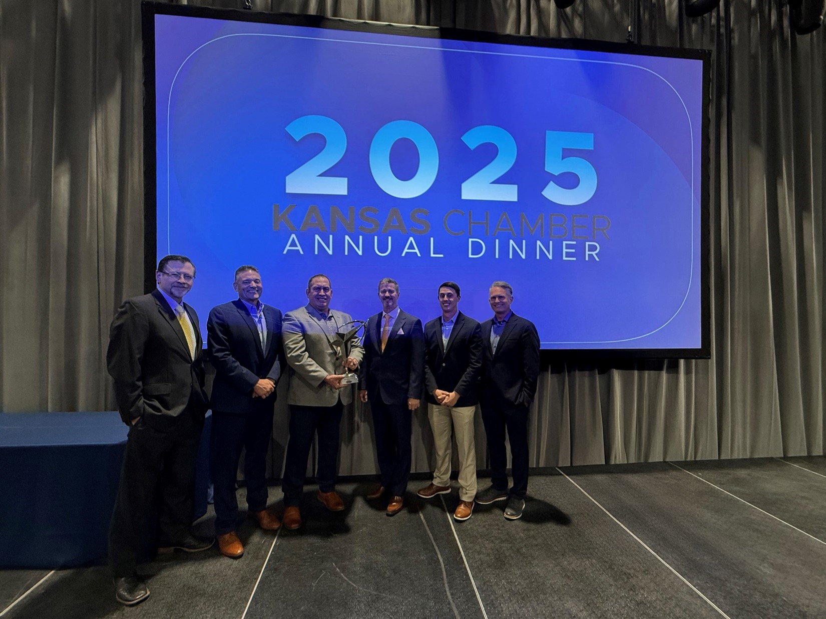 Lowen Corporation executives receive the 2025 Ad Astra Award at the Kansas Chamber Annual Dinner in Topeka, Kansas.