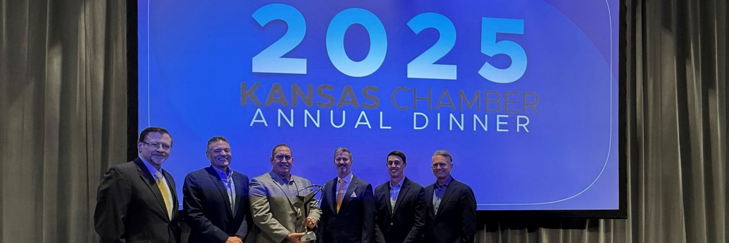 Lowen Corporation executives receive the 2025 Ad Astra Award at the Kansas Chamber Annual Dinner in Topeka, Kansas.
