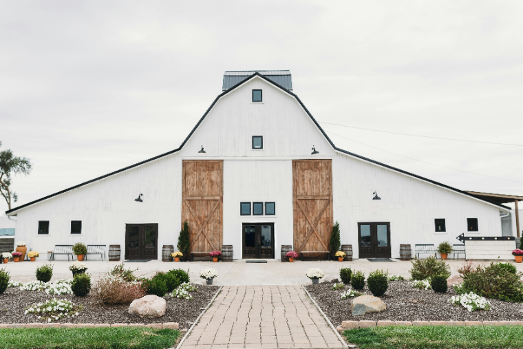 Elegant estate terrace set for a luxury wedding reception