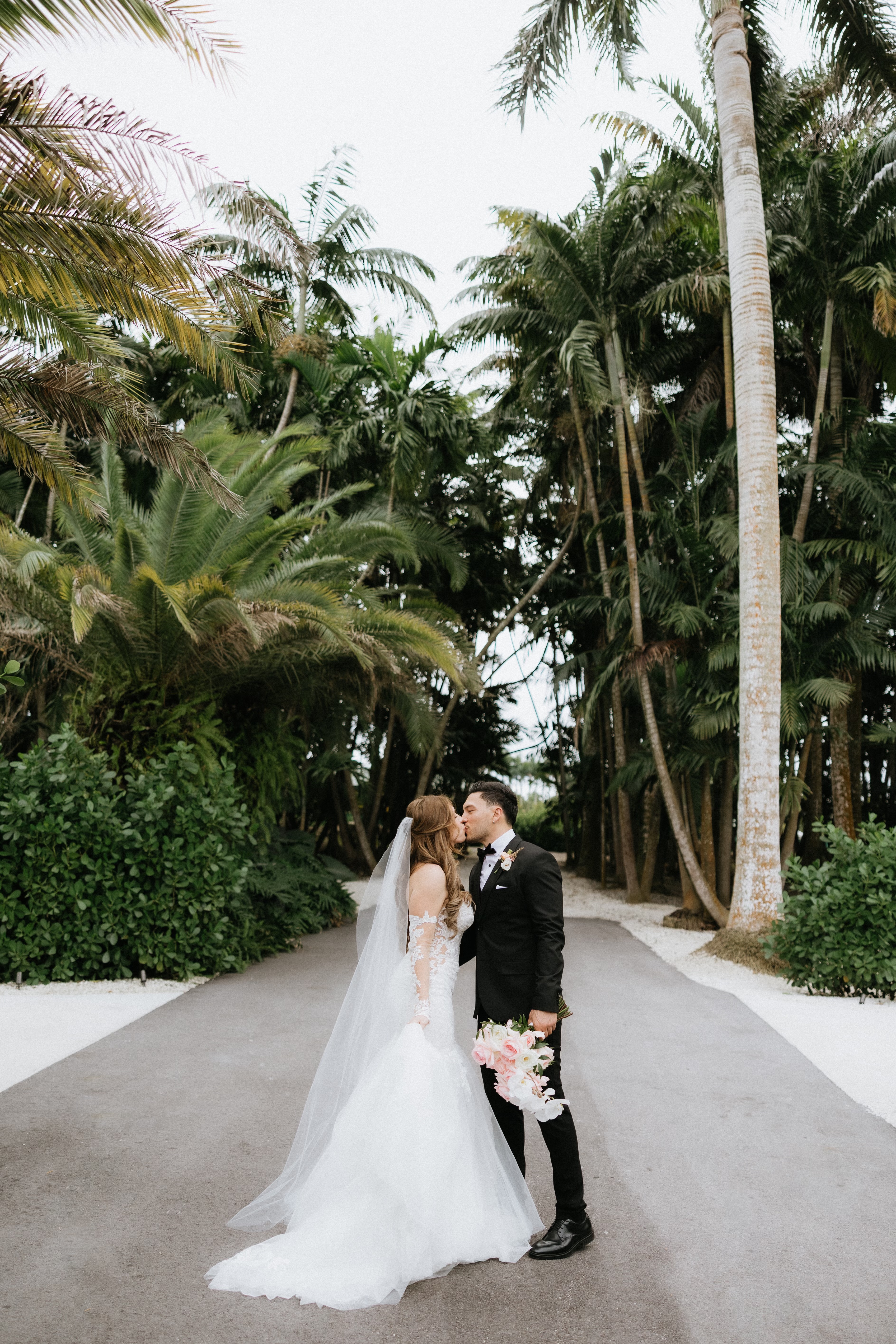 A sunlit reception hall set for a wedding at Gran Paraiso Gardens, Miami