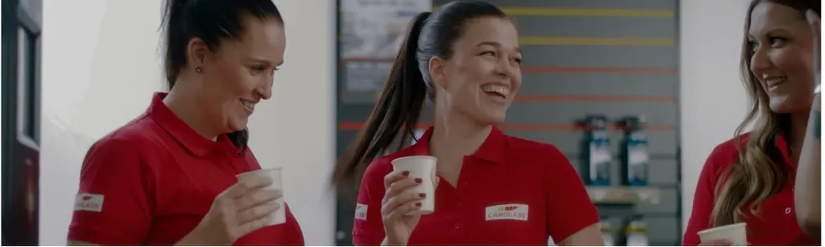Employees taking coffee and chatting