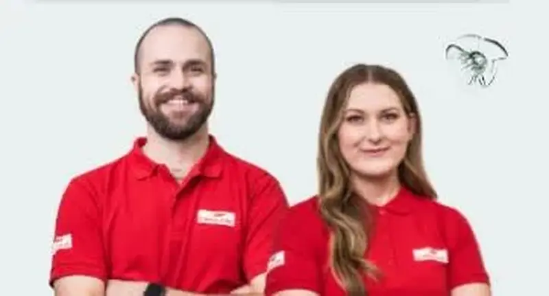 Staff man and woman smiling