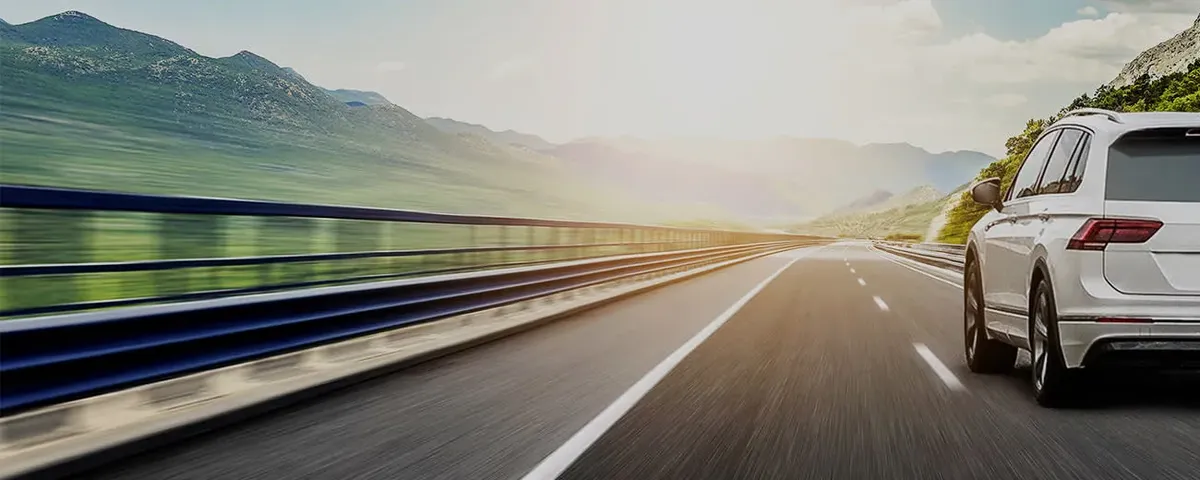 Car on sunny road