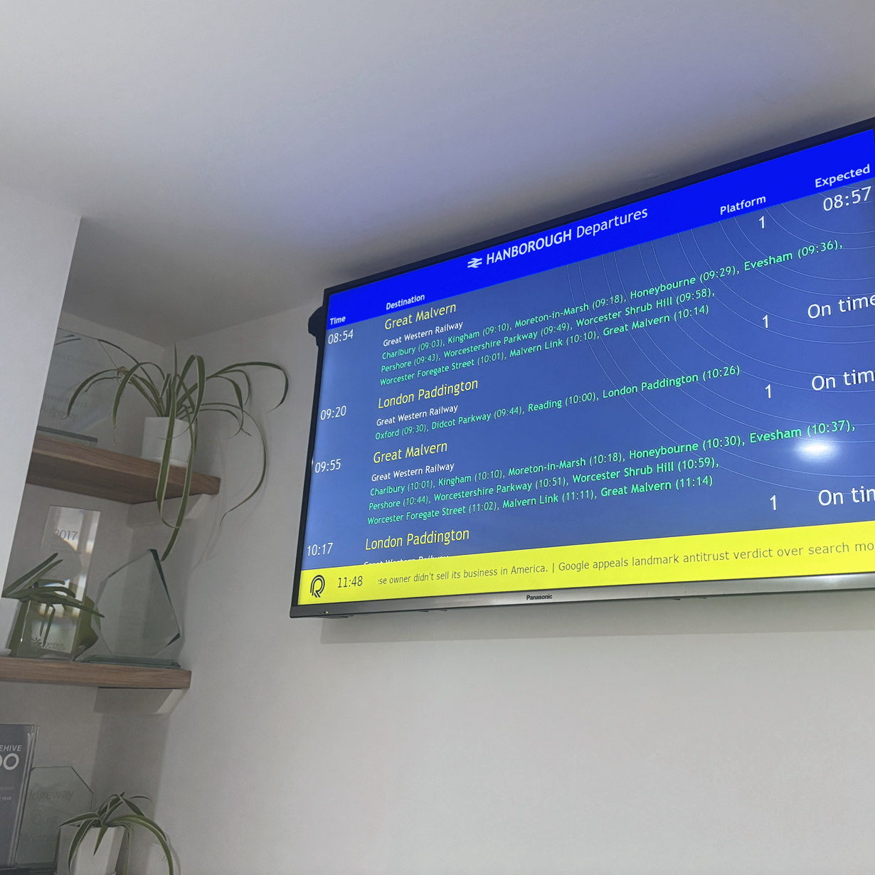 In info screen showing train departure times from Hanborough station.