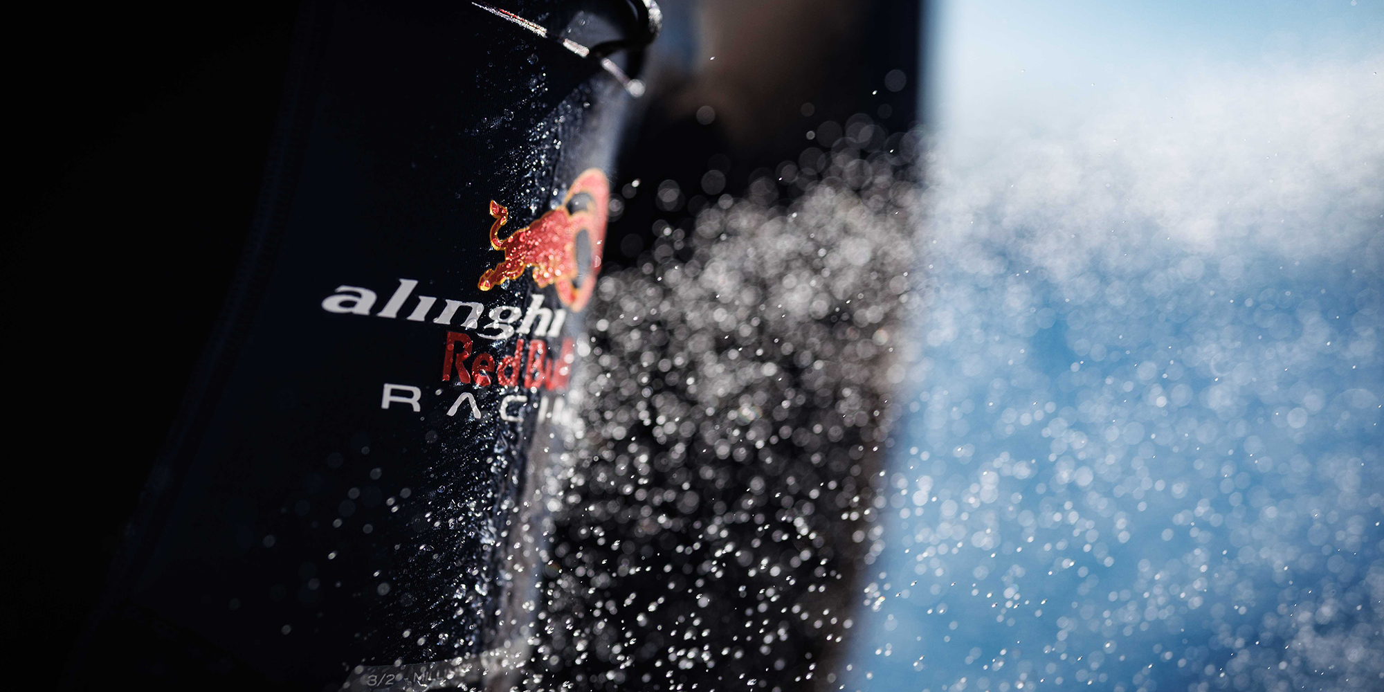 Alinghi Red Bull Racing AC75 sailing on the water