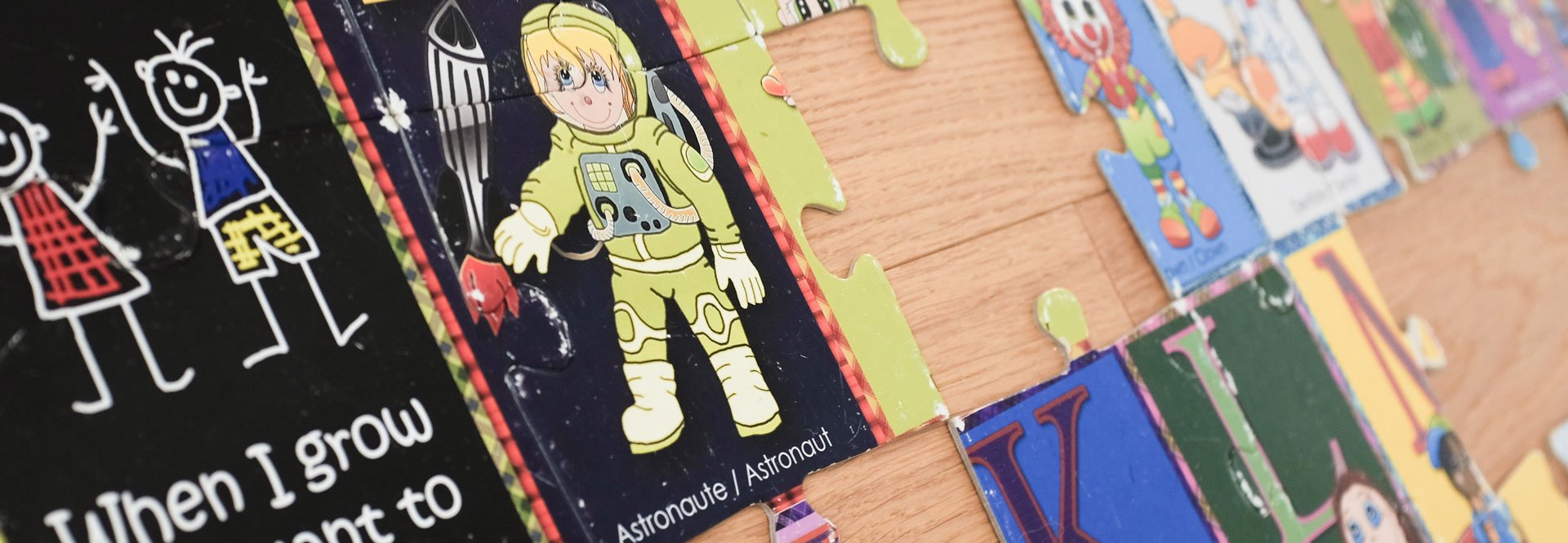 An alphabet jigsaw puzzle laid out in rows