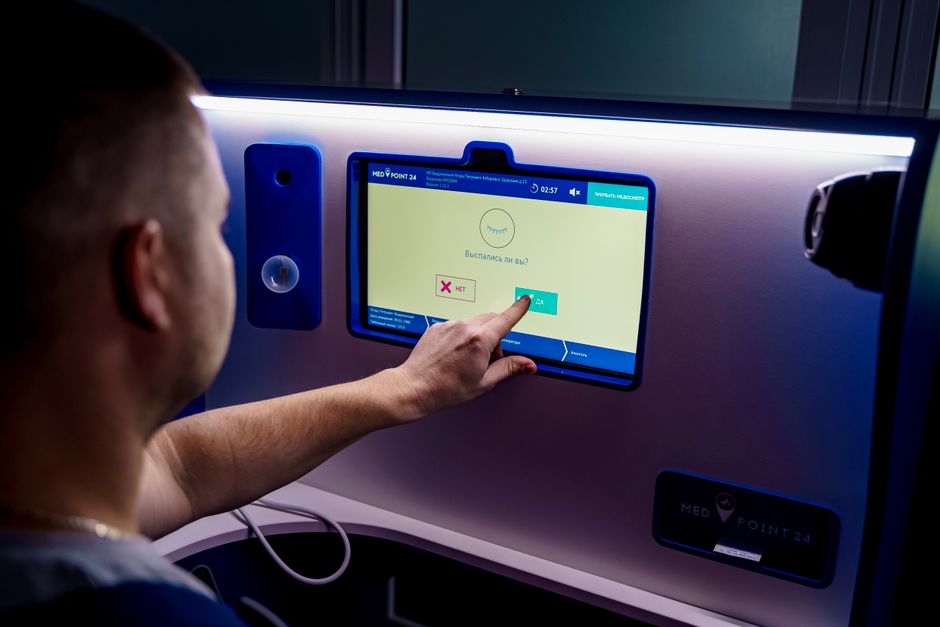 Member checking in at a wellness kiosk