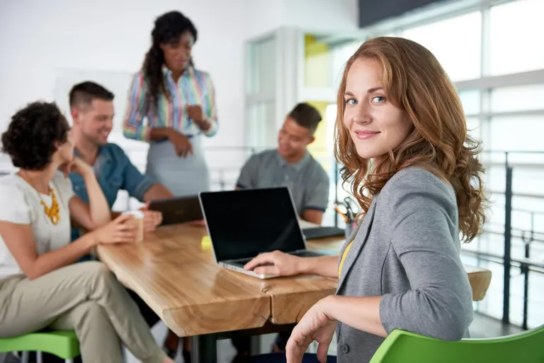 Businesswoman using a laptop during meeting