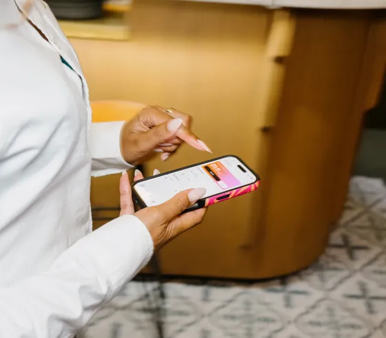 Employee checking the Shiftbase app on a phone