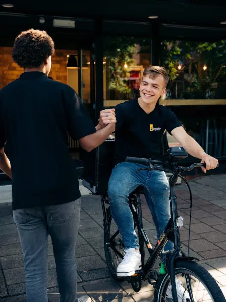 Spare Rib Express delivery rider setting off