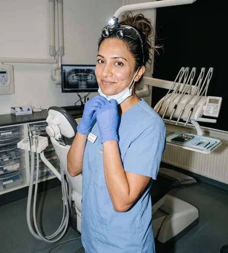 Clinician getting ready for the next patient in the treatment room